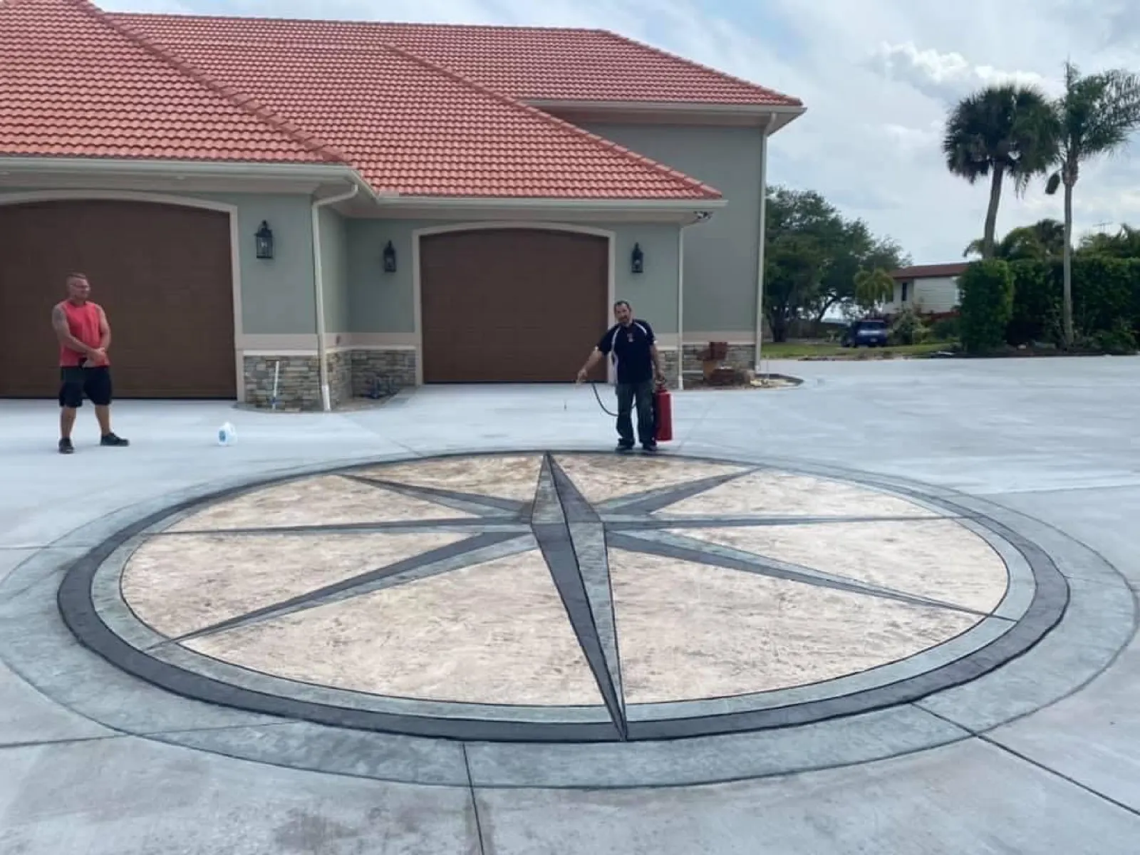 Ashlar slate stamped concrete driveway