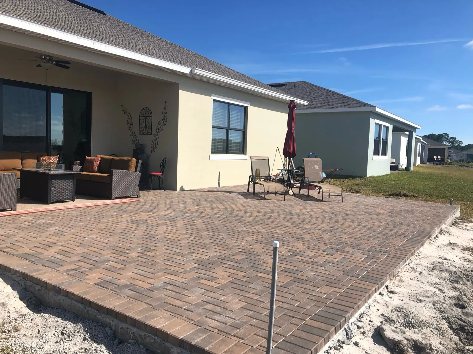 Herringbone paver patio ready for furniture